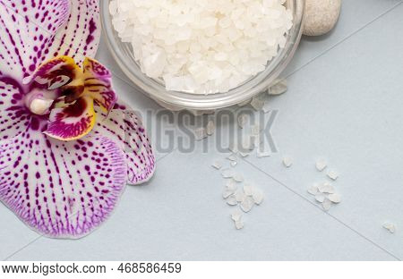 Spa Wellness Concept.pebbles Rocks In Pyramid Sea Salt And Orchid Flower