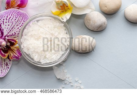 Spa Wellness Concept.pebbles Rocks In Pyramid Sea Salt And Orchid Flower