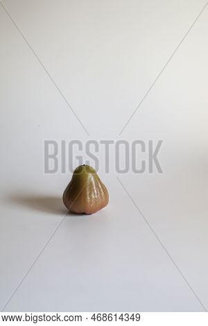 Rose Apple Or Chomphu Fruit On White Background. The Fruits Are Sweet And Red Or Green.