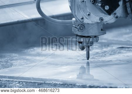 Close-up Scene Of Multi-axis Abrasive Waterjet Cutting Machine Cutting The Aluminum Plate. The High 