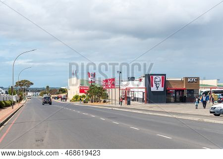 Bredasdorp, South Africa - Sep 23, 2022: A Street Scene, With Business, People And Vehicles, In Bred