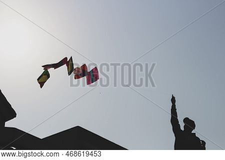 A Person Flying Kites  During Kite Festival Makar Sankranti Pongal Basant Panchami