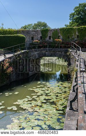 A River With An Old Bridge In Summer, Daylight, Romantic, Bergues (france)