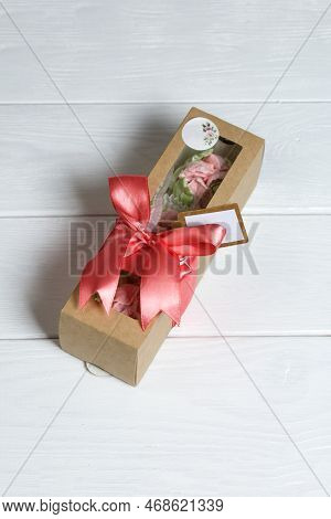 Zephyr Handmade In A Gift Box. Marshmallow In A Box Tied With A Ribbon. Zephyr Tulips. On White Boar