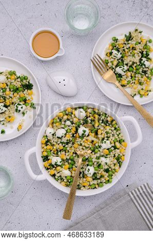 Salad Of Vegetables, Pasta And Mozzarella In A Dish On A Light Background. Top View.