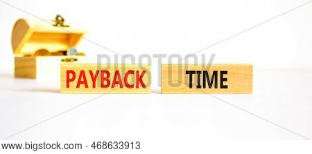 Payback Time Symbol. Concept Words Payback Time On Wooden Blocks. Beautiful White Table White Backgr
