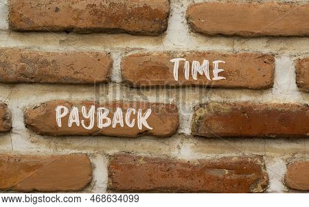Payback Time Symbol. Concept Words Payback Time On Brown Brick Wall. Beautiful Brown Brick Wall Back