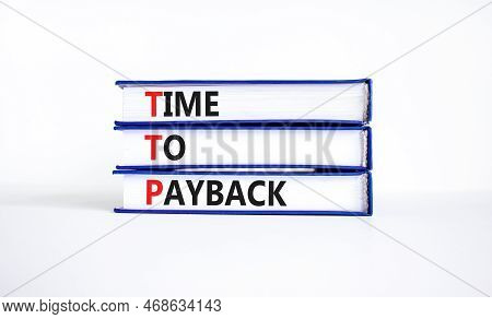 Ttp Time To Payback Symbol. Concept Words Ttp Time To Payback On Books On A Beautiful White Table Wh
