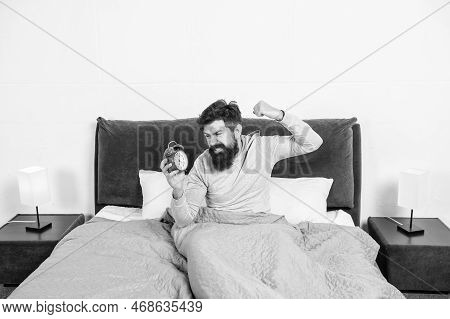 Angry Man Figting With Alarm Clock Being In Bed In Morning, Overslept