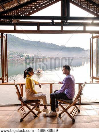 A Couple Of Men And Women Visit The Chinese Village Mae Hong Son, Ban Rak Thai, A Chinese Settlement