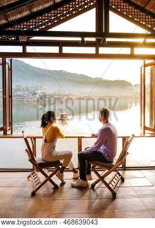 A Couple Of Men And Women Visit The Chinese Village Mae Hong Son, Ban Rak Thai, A Chinese Settlement