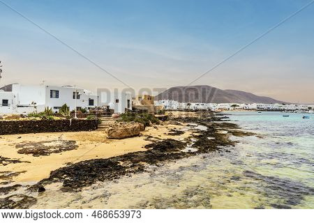 Beach And White Architecture In Caleta Del Sebo, La Graciosa, Canary Islands, Spain