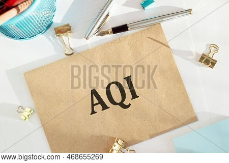 Aqi Abbreviation Of Air Quality Index Text On A Craft Paper On The Light Background With Charts Pape