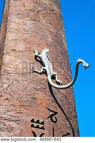 Florence, Tuscany, Italy - October 18, 2022: Sculpture Of A Lizard With Another Head On Its Tail. Th