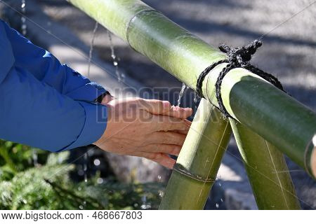 The Purification Fountain 'chozuya' In The Japanese Shrine. It's Place Where You Wash Your Hands And