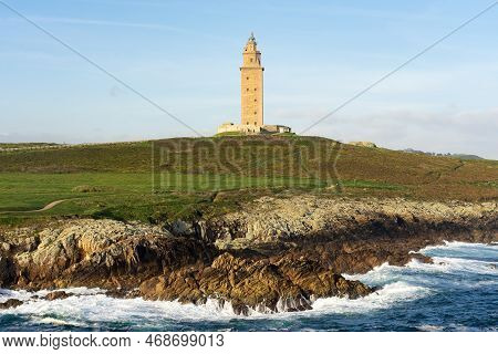 Hercules Tower Roman Lighthouse In The City Of A Coruña In A Sunny Day, Galicia, Spain.