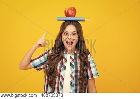 Back To School. Teenager Schoolgirl With Apple On Head, Ready To Learn. School Children On Isolated 