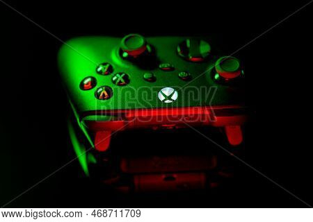 January 9, 2023, Odessa, Ukraine. A Black Xbox Wireless Controller Highlighted In Green And Red. Com