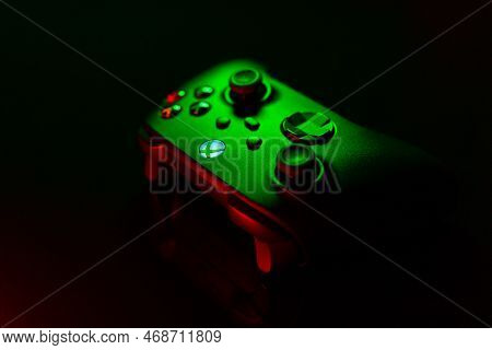 January 9, 2023, Odessa, Ukraine. A Black Xbox Wireless Controller Highlighted In Green And Red. Com