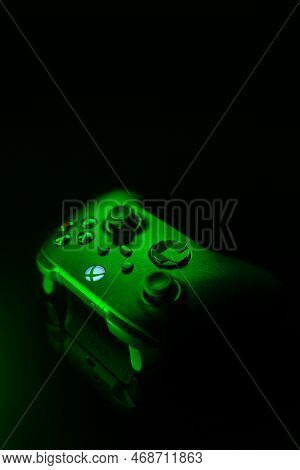 January 9, 2023, Odessa, Ukraine. A Black Xbox Wireless Controller Highlighted In Green. Compatible 