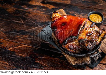 Bavarian Schweinshaxe Roast Pork Hock Ham, Knuckle With Sauerkraut. Wooden Background. Top View. Cop