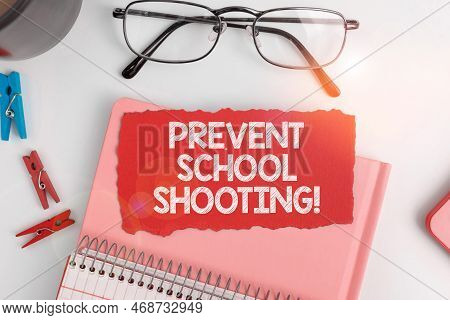 Hand Writing Sign Prevent School Shooting. Business Idea Actions Committed To Terminate Use Of Firea