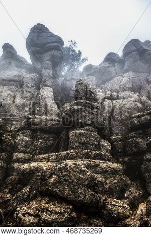 El Torcal De Antequera In The Fog, Malaga, Spain. Unusual Stunning Rock Formation