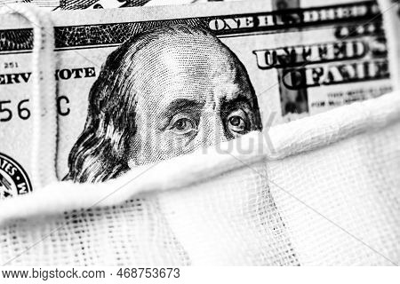 A Hundred-dollar Bill With A Medical Mask .the Concept Of Coronavrius Epidemic