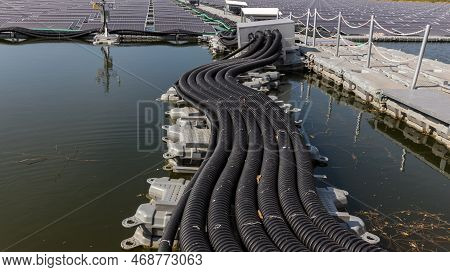 The Main Power Cable Installed With Flexible Cable Conduit To Floating Solar Pv System. Floating Pho