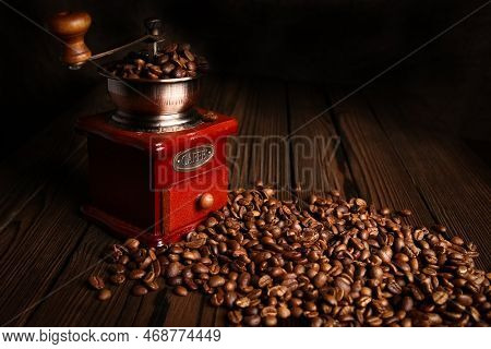 A Coffee Grinder And Coffee Background A