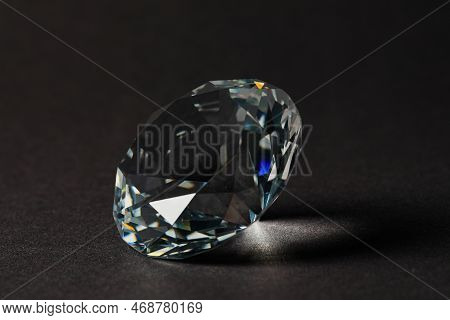 Beautiful Dazzling Diamond On Dark Background, Closeup. Precious Gemstone