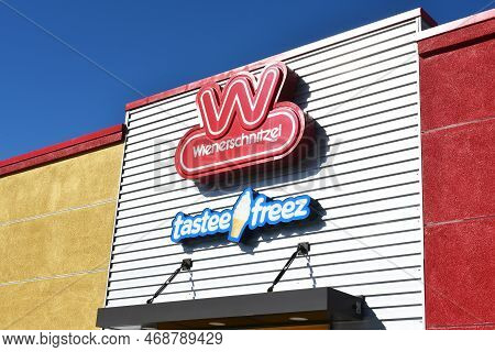 Laguna Hills, California - 8 Jan 2023: A Wienerschnitzel  And Tastee Freez Fast Food Restaurant Sign
