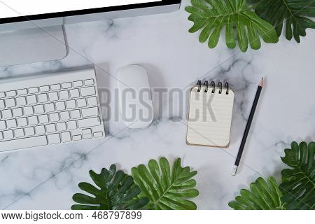 Empt Notebook And Computer On Marble Background.