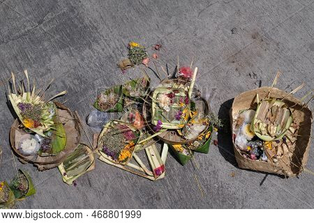 Canang Sari Has Dried Up Because Of The Hot Sun. Flat Lay Or Top View.
