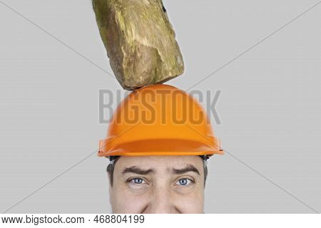 Safety Helmet. Brick And A Board Fall On Builder Head. Saving A Life Due To Wearing A Protective Con