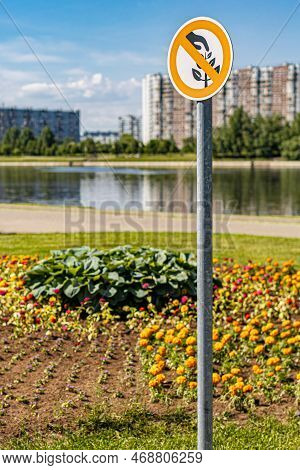 A Sign Prohibiting Picking Flowers In The Park. Ban On Picking Flowers. Growing Flowers.