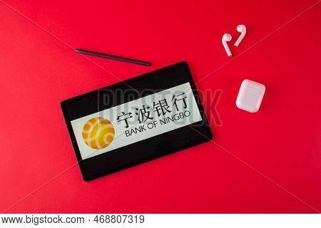 Tula, Russia - October 19, 2021: Bank Of Ningbo Displayed Modern Laptop On Red Background