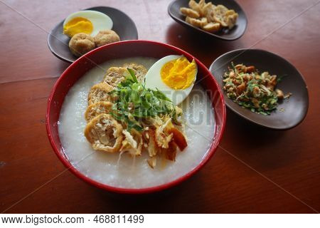 Congee Porridge With Chicken Slice, Tofu, Egg. Congee Porridge From Hong Kong. Chinese Food