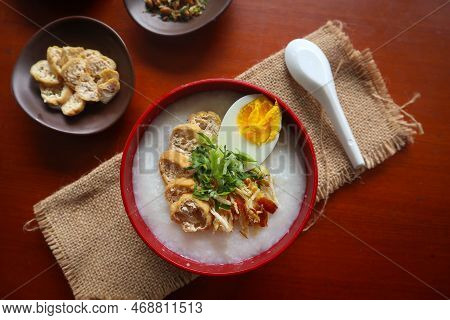 Congee Porridge With Chicken Slice, Tofu, Egg. Congee Porridge From Hong Kong. Chinese Food