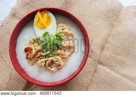 Congee Porridge With Chicken Slice, Tofu, Egg. Congee Porridge From Hong Kong. Chinese Food