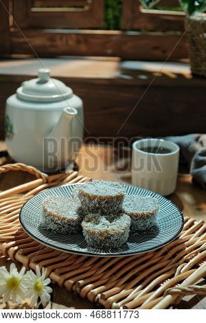 Steamed Rice Cake Or Locally Known As Kuih Lompang Or Kuih Kasui With Desiccated Coconut On Top. Sel
