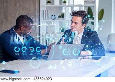Two Businessmen Working Together, Forex Diagrams Hologram And Big Business Data Analysis. Double Exp