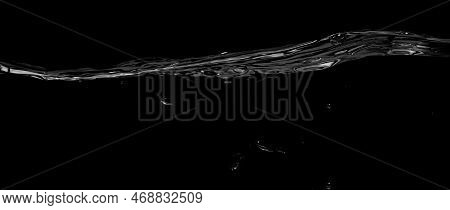 Liquid Suface Line Between Underwater And Above Water With Black Background.