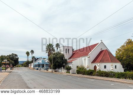 Heidelberg, South Africa - Sep 24, 2022: A Street Scene, With The St Barnabas Anglican Church And Bu