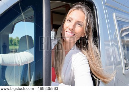 Beautiful Happy Woman Driver In Motor Home Rv Camping Van In Lifestyle Vanlife