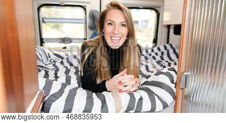 Woman Lying In Bed Motor Camper Rv Home Campervan In Vanlife