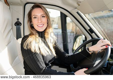 Rv Camper Trailer Travel Woman Driving Motor Home Camping Van Tourist Driver Smiling Out Window Of F