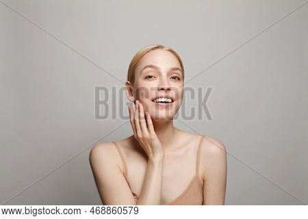 Closeup Studio Portrait Of Happy Attractive Woman With Clear Skin And Make-up On White Background. F