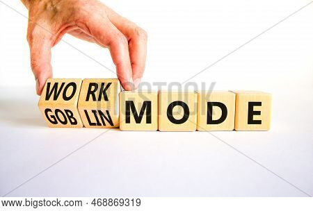Work Or Goblin Mode Symbol. Concept Word Work Mode Goblin Mode On Wooden Cubes. Businessman Hand. Be