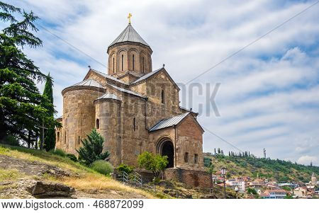Metekhi Church In Old Town Of Tbilisi, Georgia. Virgin Mary Assumption Church Of Metekhi Is Georgian
